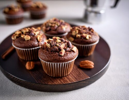 dark chocolate espresso muffins with chopped pecan toppings